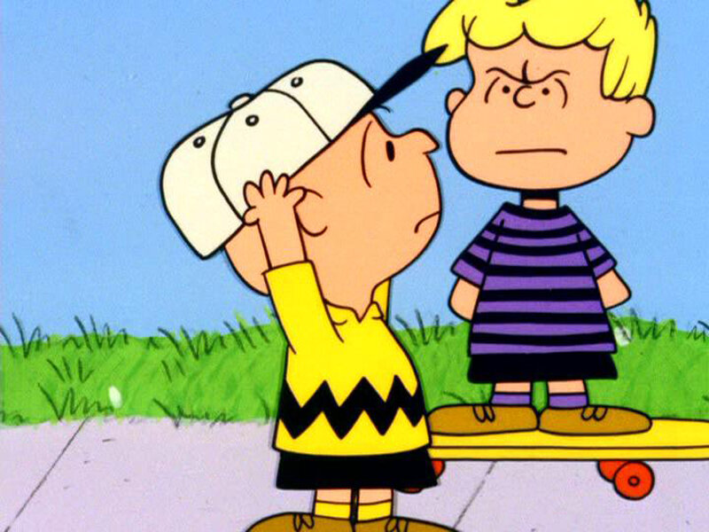 Charlie Brown and Linus on a skateboard