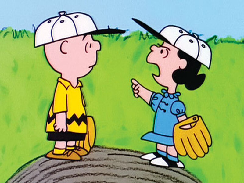 Charlie Brown and Lucy playing baseball