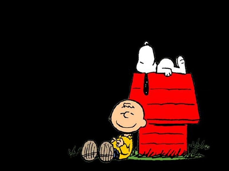 Charlie Brown and Snoopy in the yard