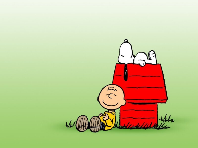 Charlie Brown and Snoopy on grass