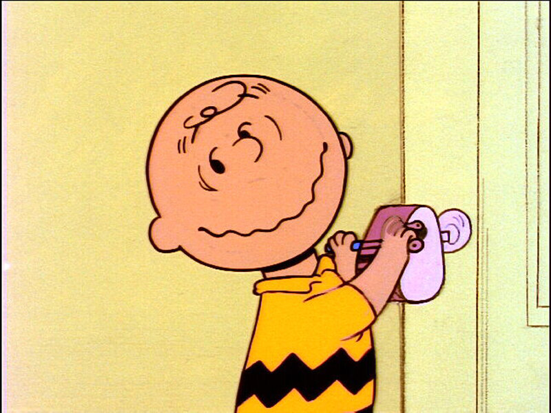 Charlie Brown with toy phone