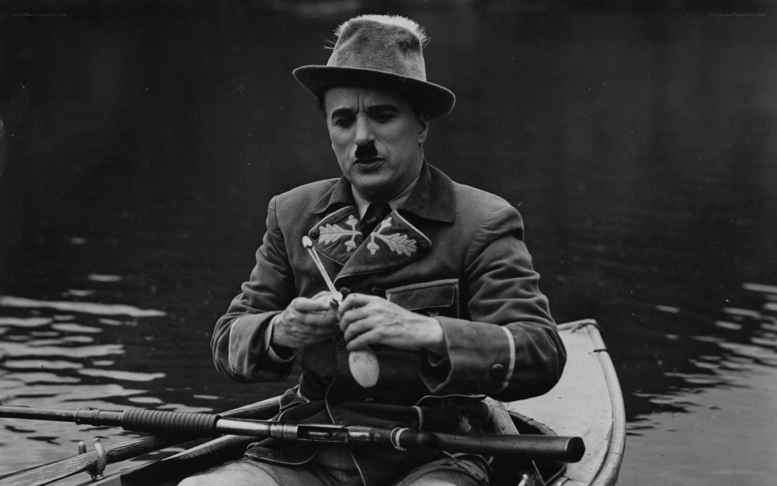 Charlie Chaplin in a boat