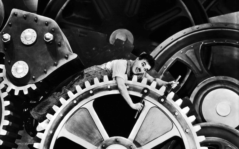 Charlie Chaplin in a factory