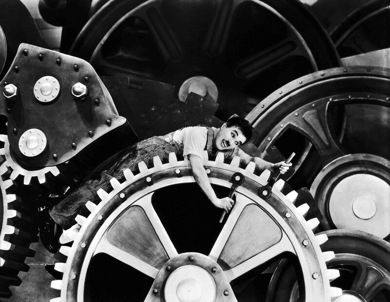 Charlie Chaplin in a factory