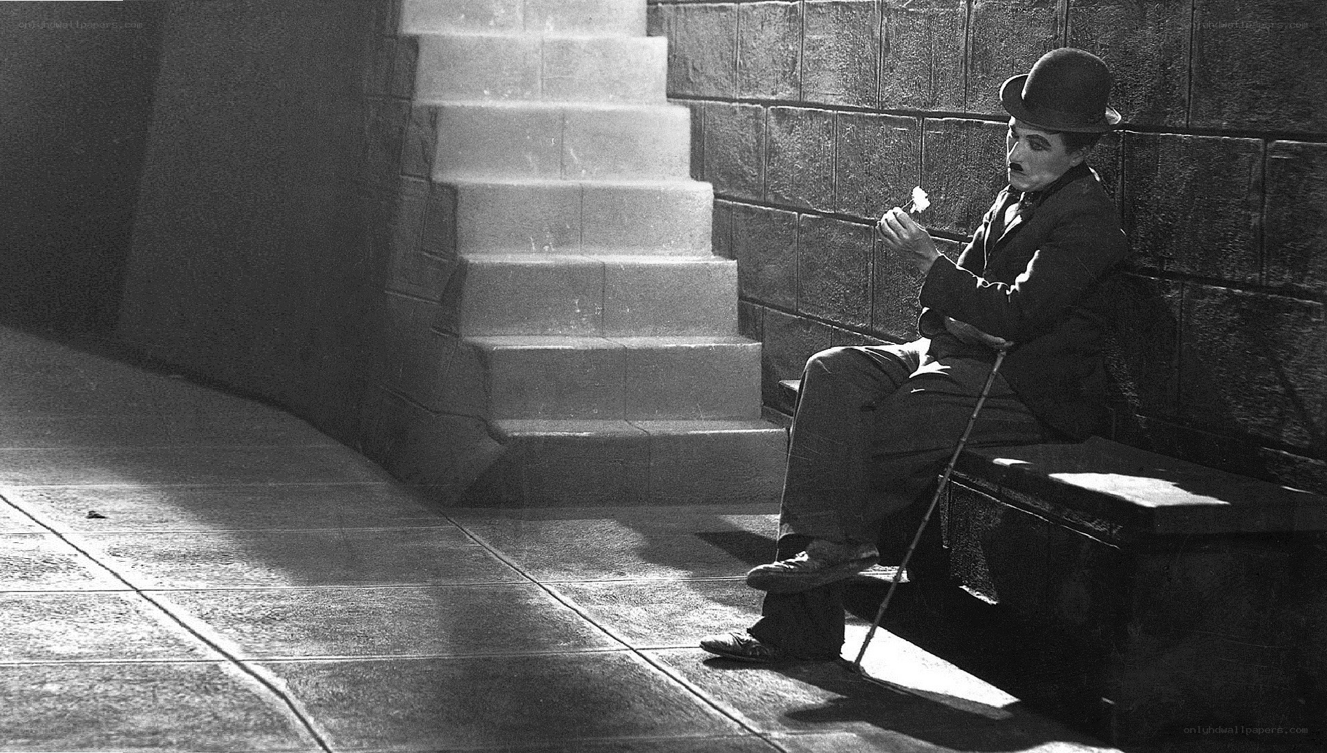 Charlie Chaplin on a bench