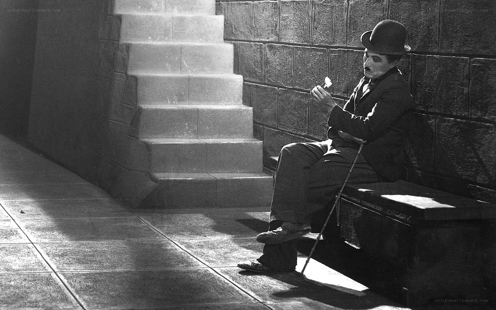 Charlie Chaplin on a bench