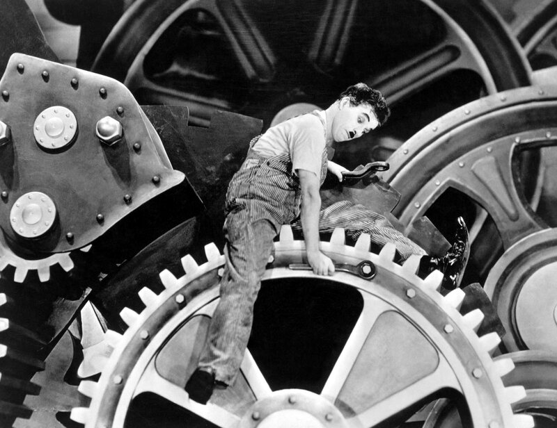 Charlie Chaplin on factory gears