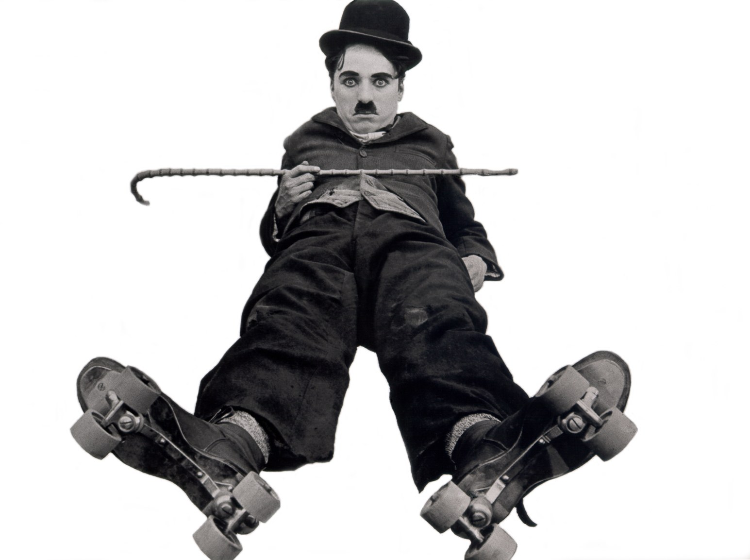 Charlie Chaplin on roller skates