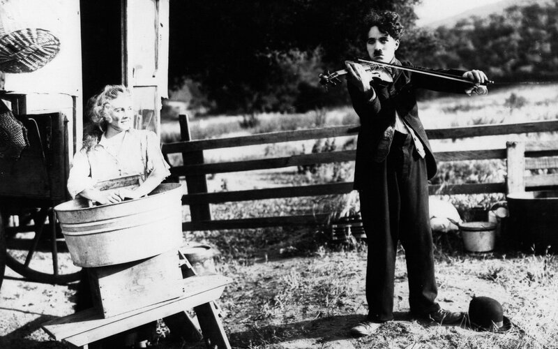 Charlie Chaplin Playing Violin — Black
