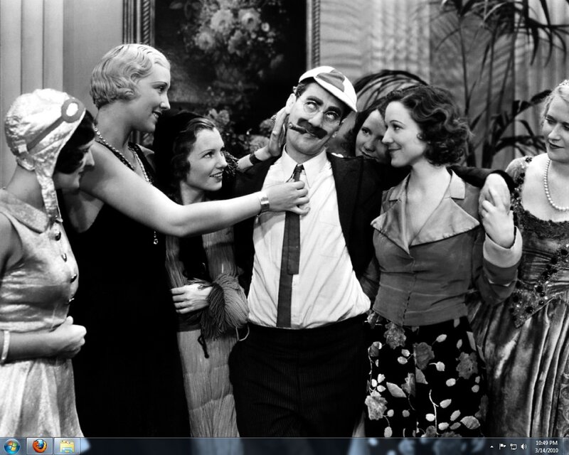 Charlie Chaplin surrounded by women