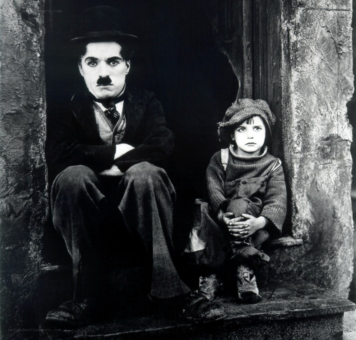 Charlie Chaplin with a child