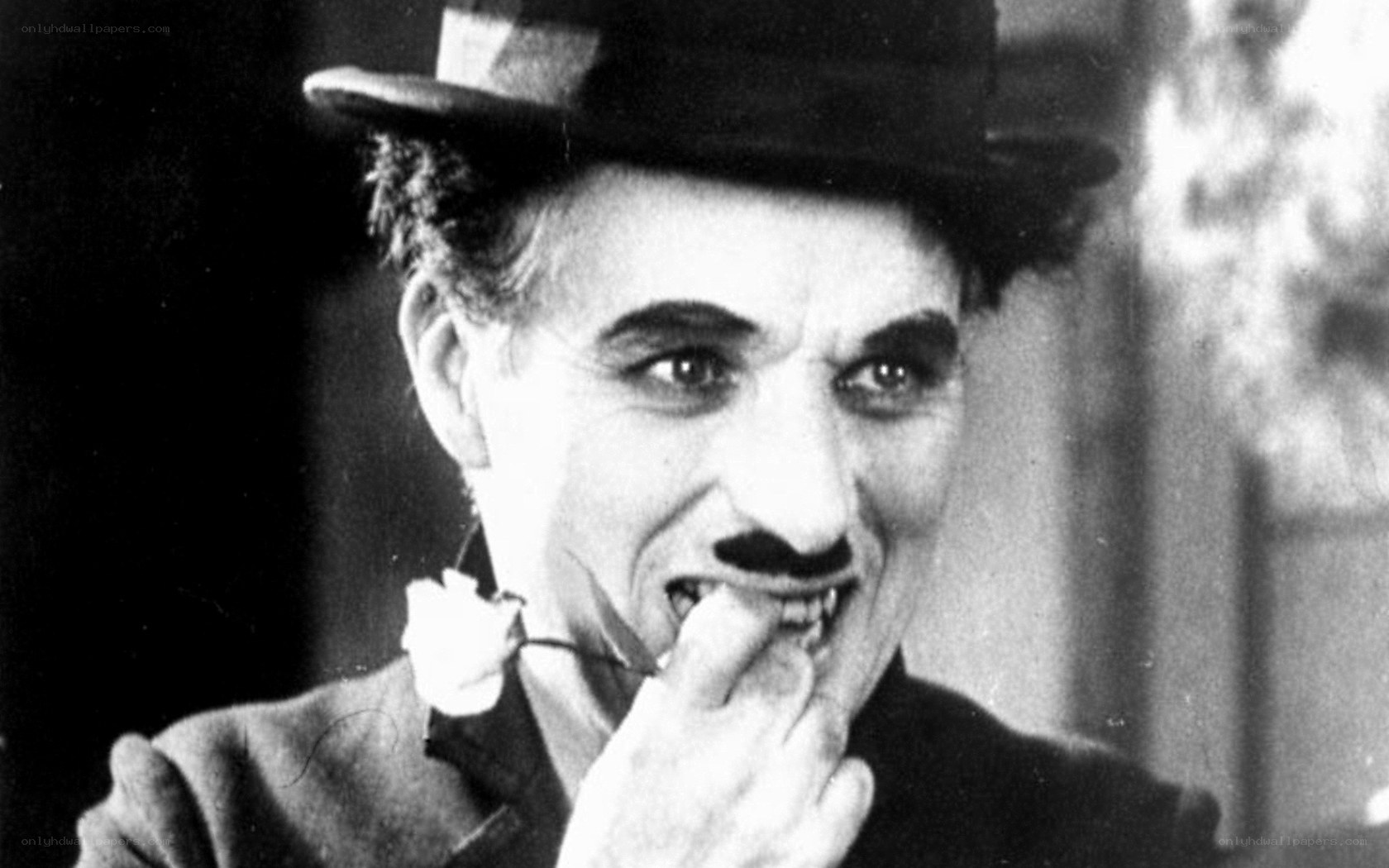Charlie Chaplin with flower