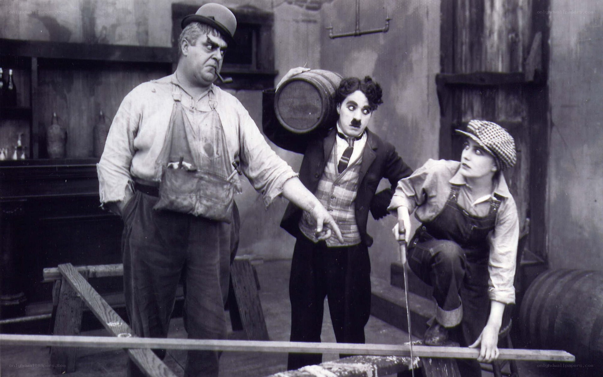 Charlie Chaplin with two men