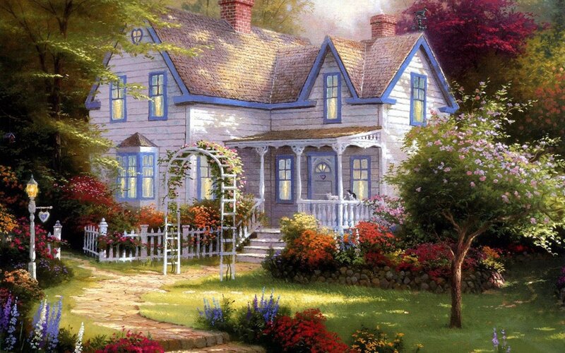 Charming cottage in a flower garden