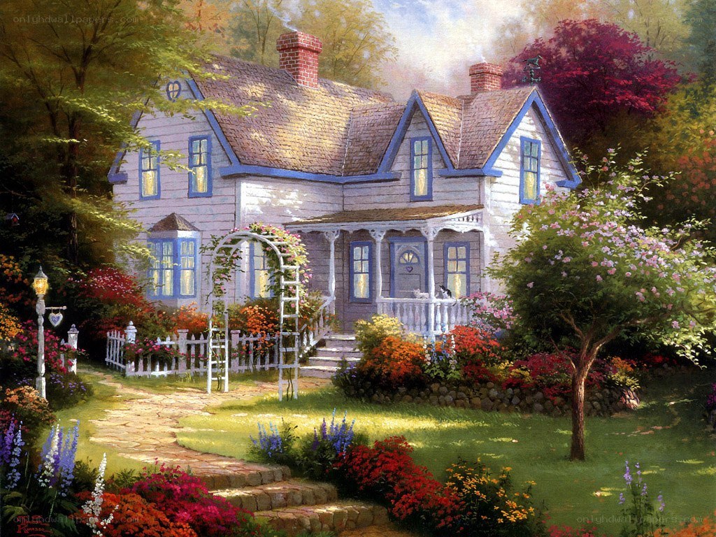 Charming cottage in a flower garden