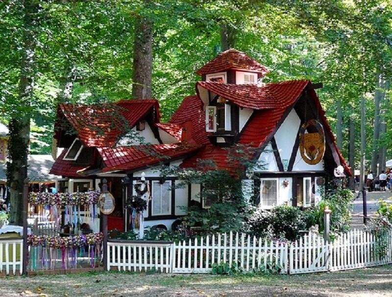Charming red-roofed cottage in forest