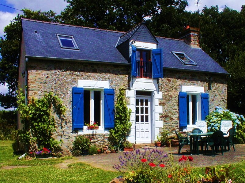 Charming stone cottage with blue shutters