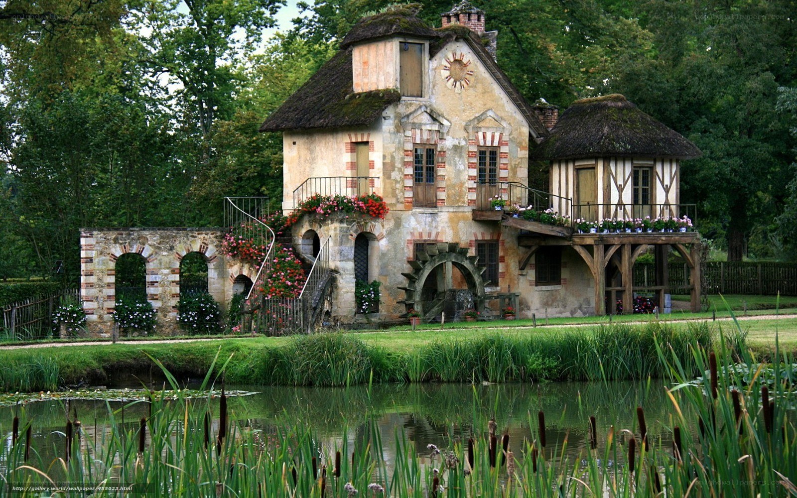 Charming watermill by a pond