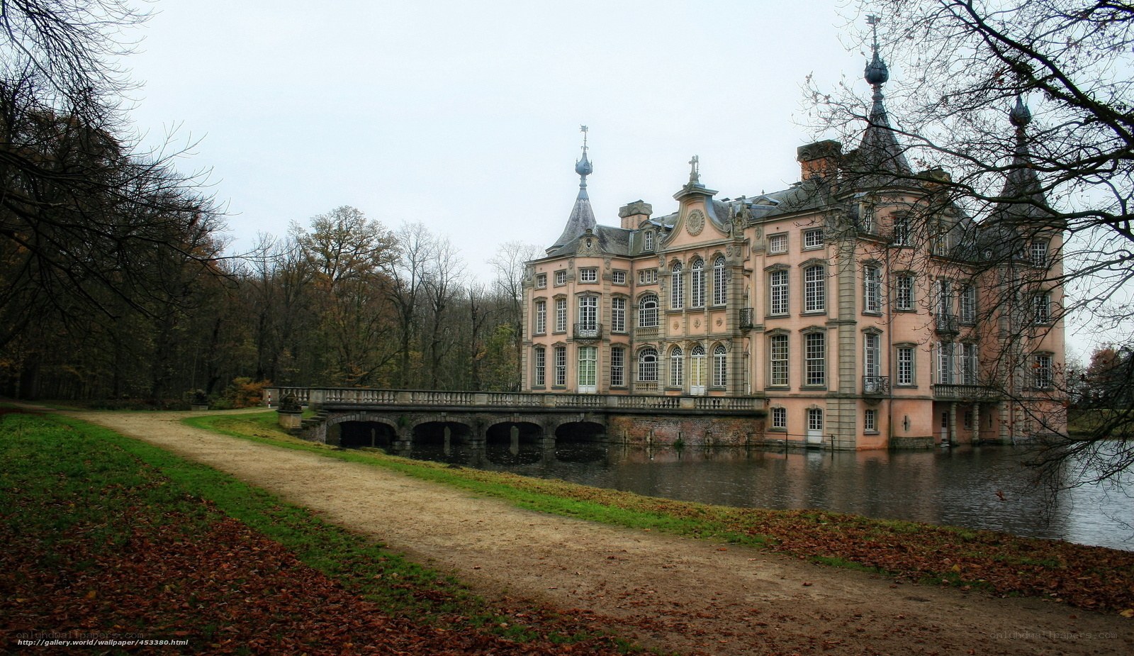 Chateau by a moat in autumn