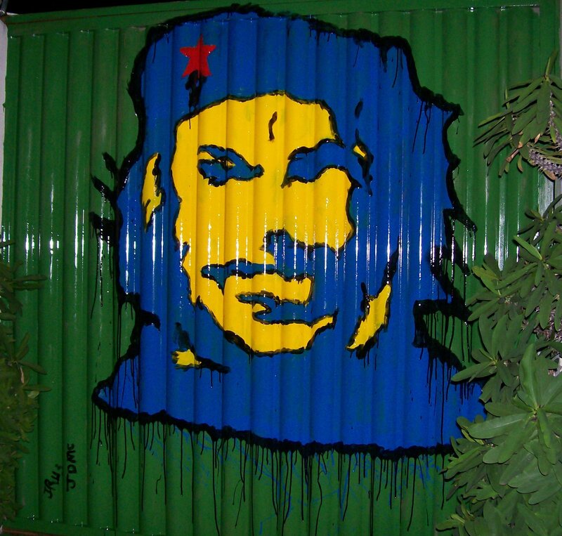 Che Guevara mural on green wall