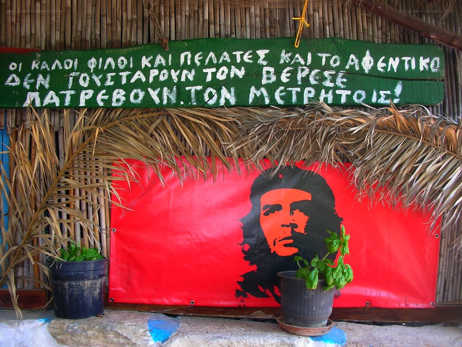 Che Guevara poster at a rustic hut
