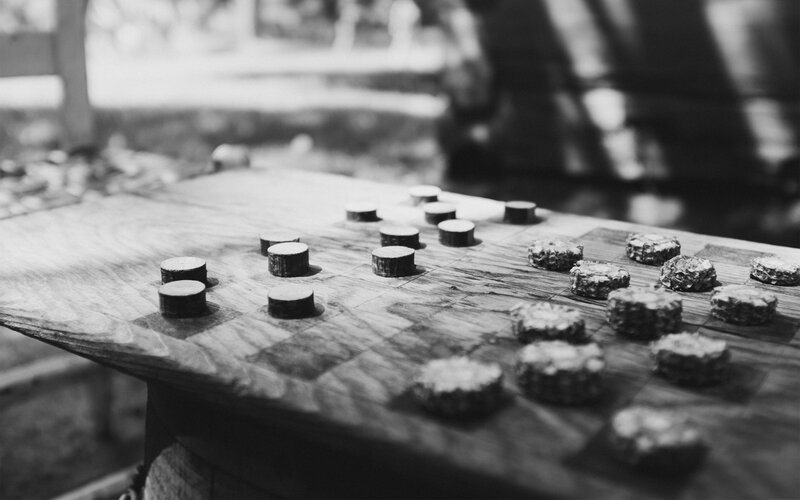 Checkers Game on Wooden Board
