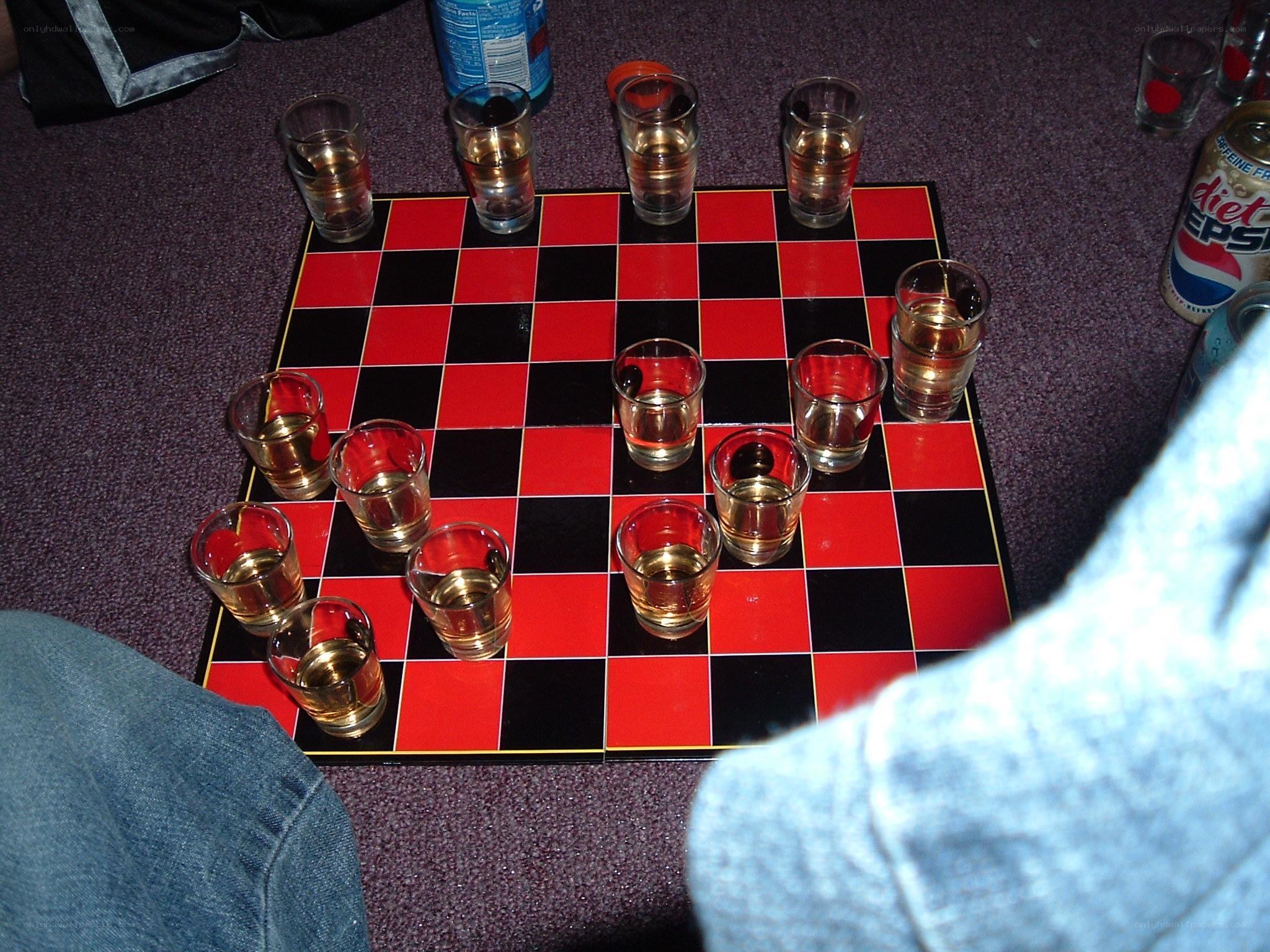 Checkers game with shot glasses