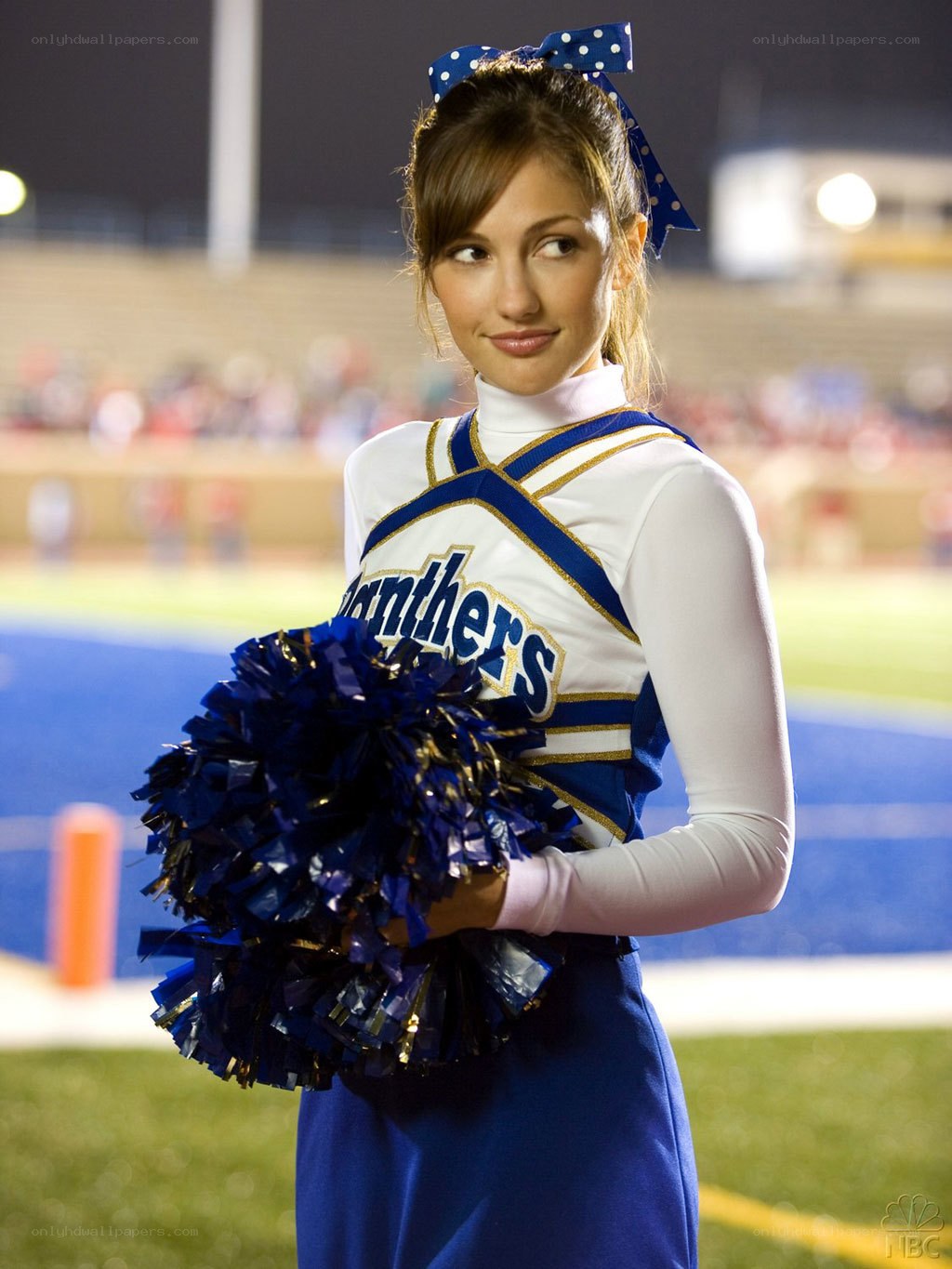 cheerleader at night game