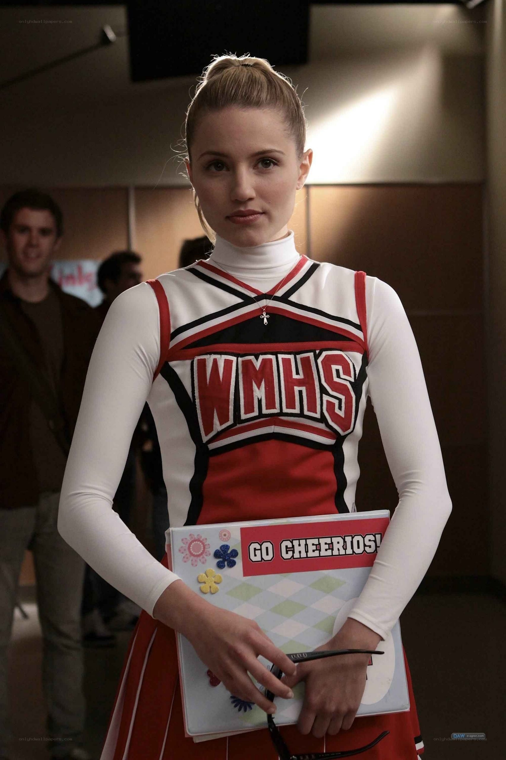 cheerleader holding binder