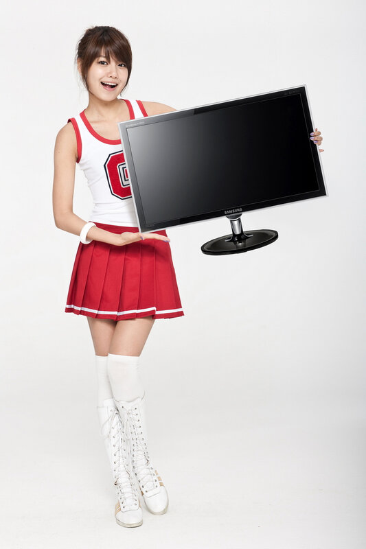 cheerleader holding monitor