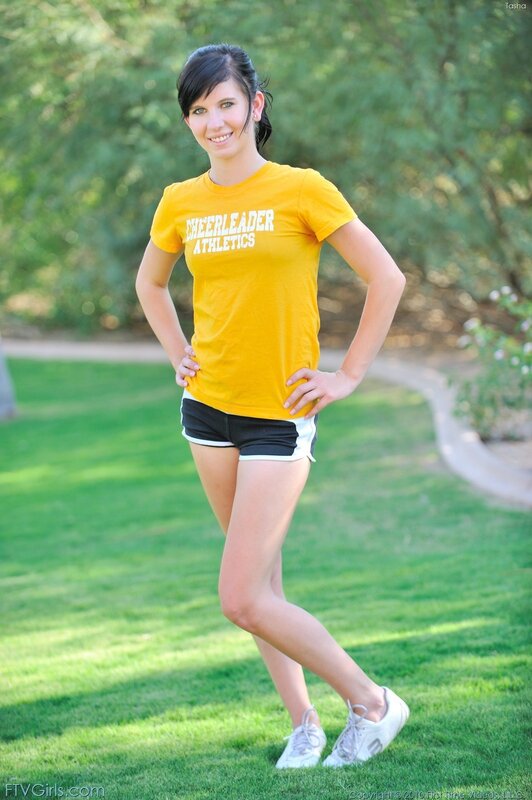 cheerleader in yellow shirt