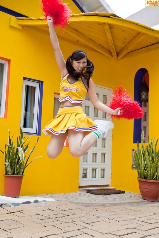 cheerleader jumping outside