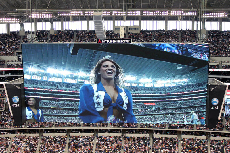 Cheerleader on stadium screen