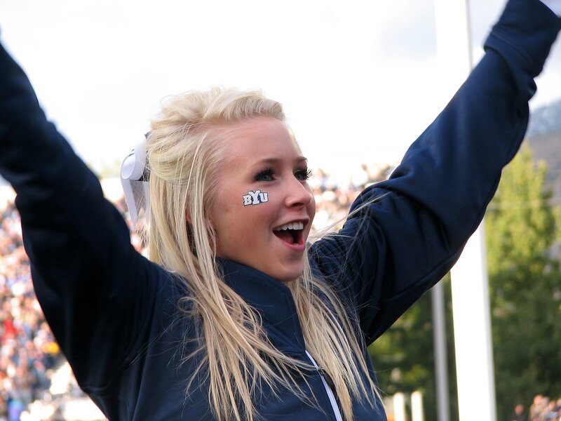 cheerleader with BYU face paint