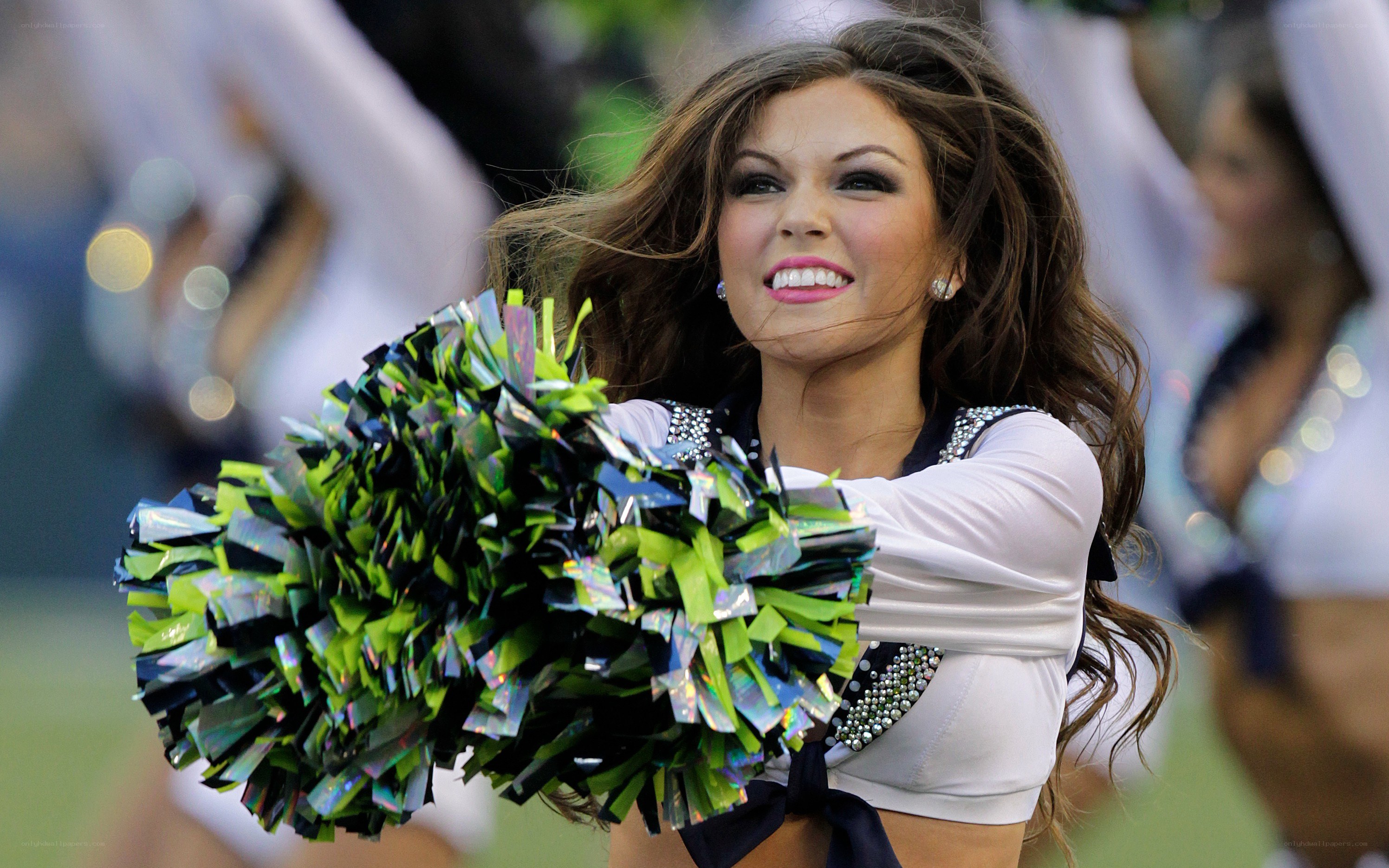Cheerleader with pom-poms