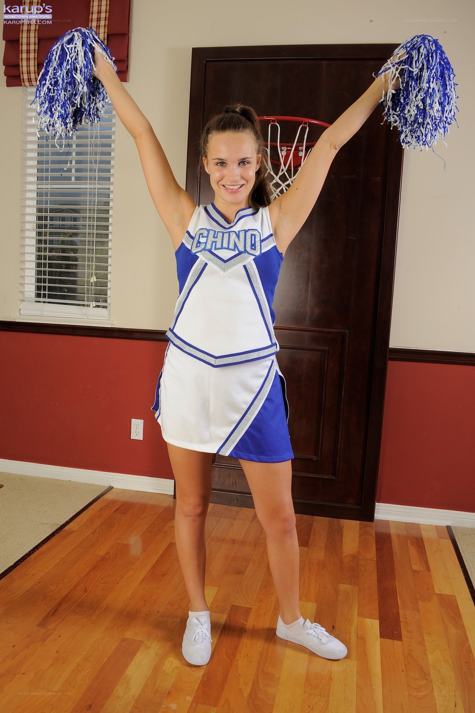 cheerleader with pom-poms
