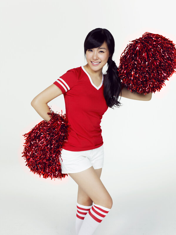 cheerleader with pom-poms