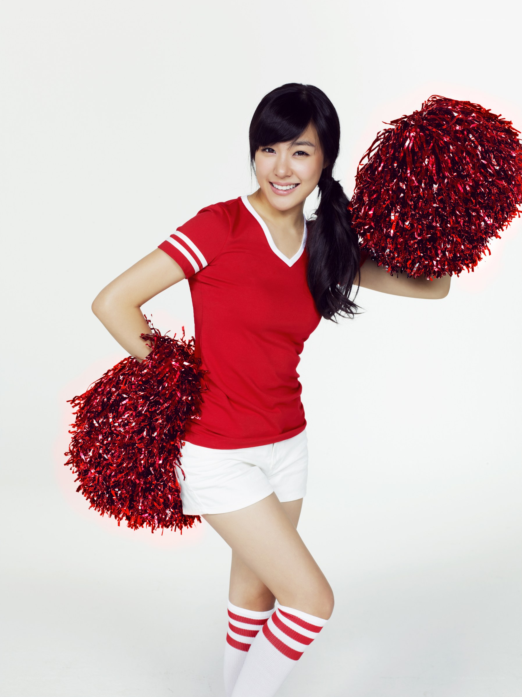 cheerleader with pom-poms
