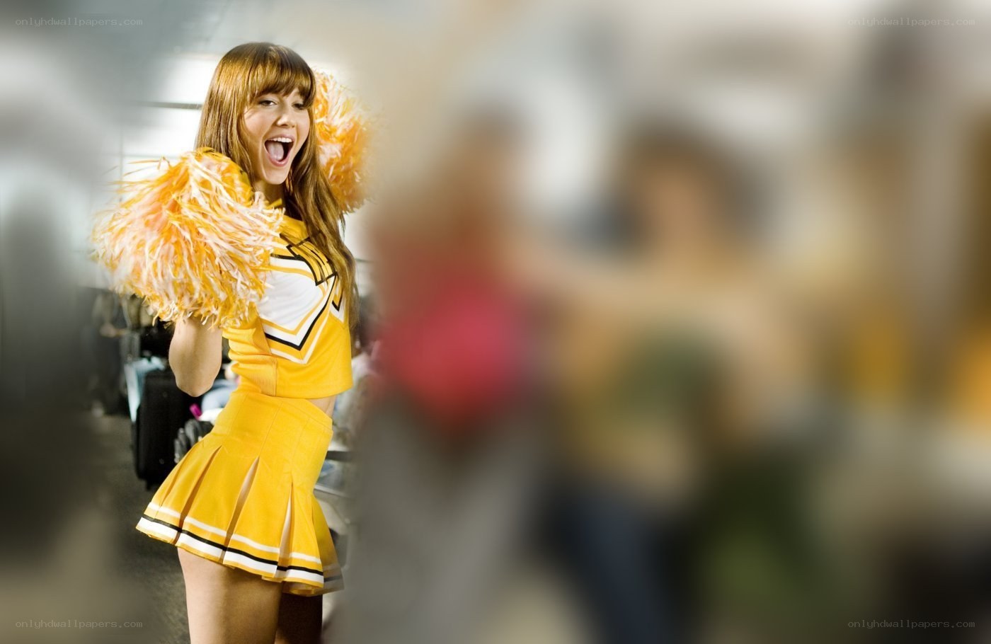 cheerleader with pom-poms