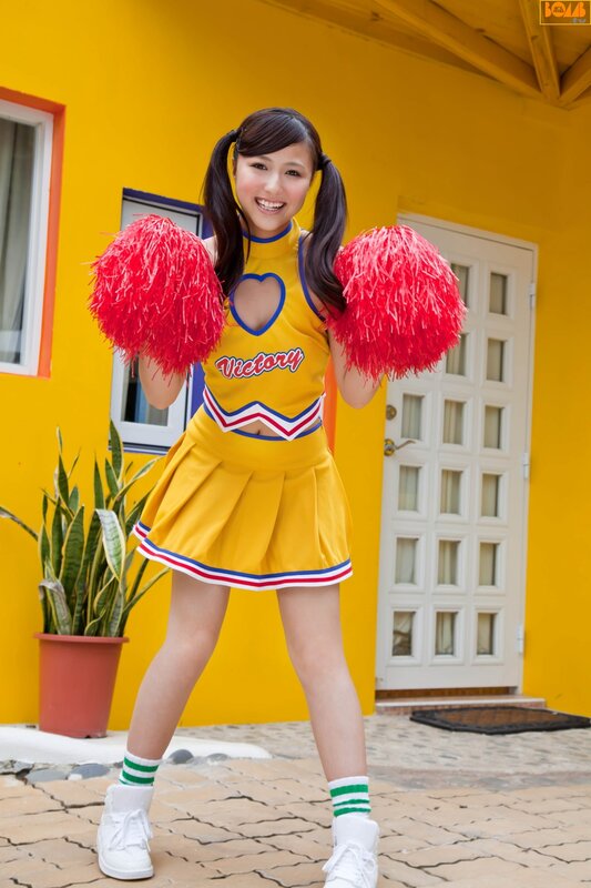 cheerleader with pom-poms