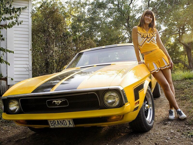 Cheerleader with yellow Mustang