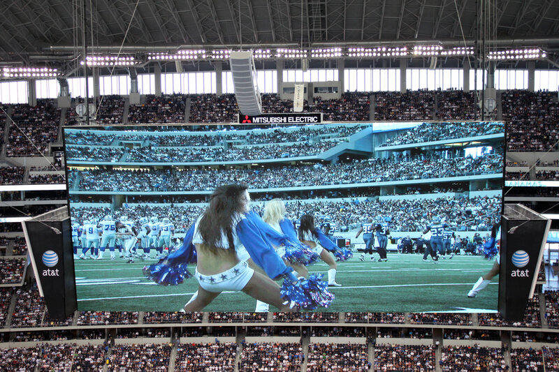 Cheerleaders at football game
