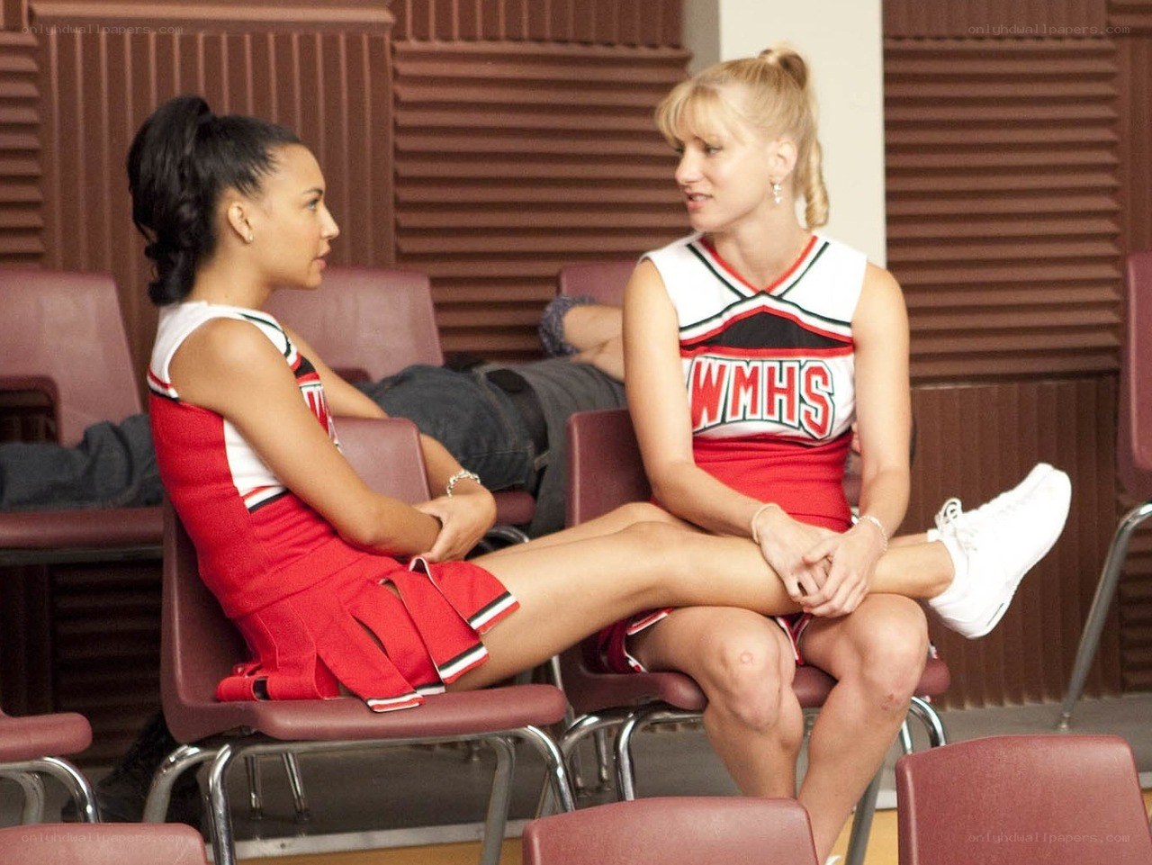 Cheerleaders in conversation