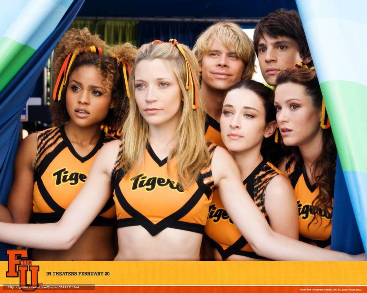 Cheerleaders in orange uniforms