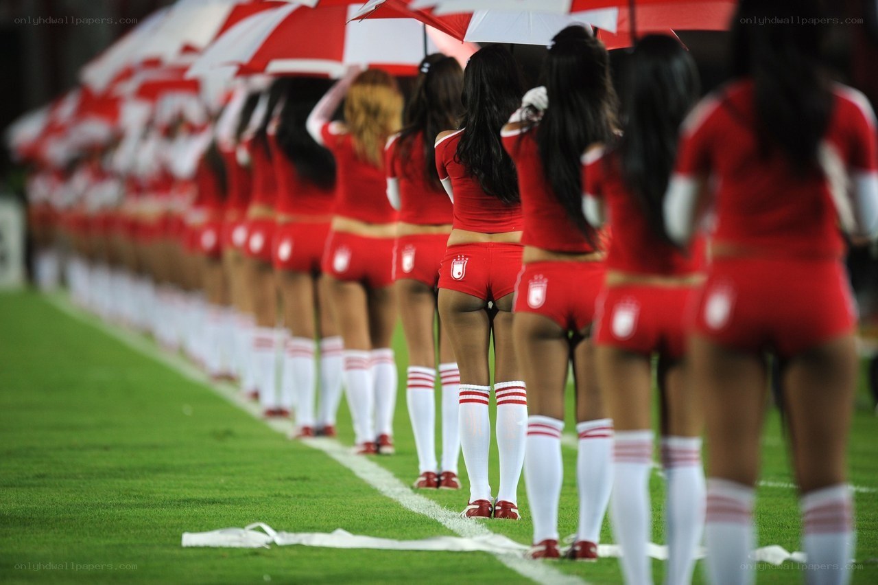 cheerleaders in red uniforms