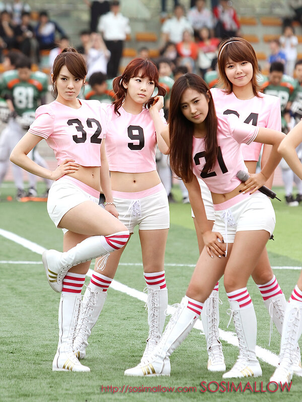 cheerleaders on a football field