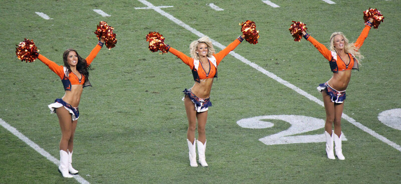 Cheerleaders on Field — Orange, Energetic