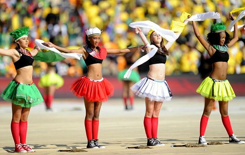 Cheerleaders performing at a stadium