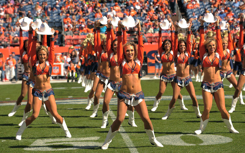 Cheerleaders Performing on Field — Orange