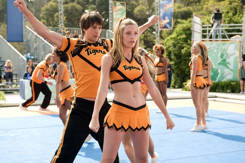Cheerleaders Performing — Orange, Energetic, Afternoon, Photograph
